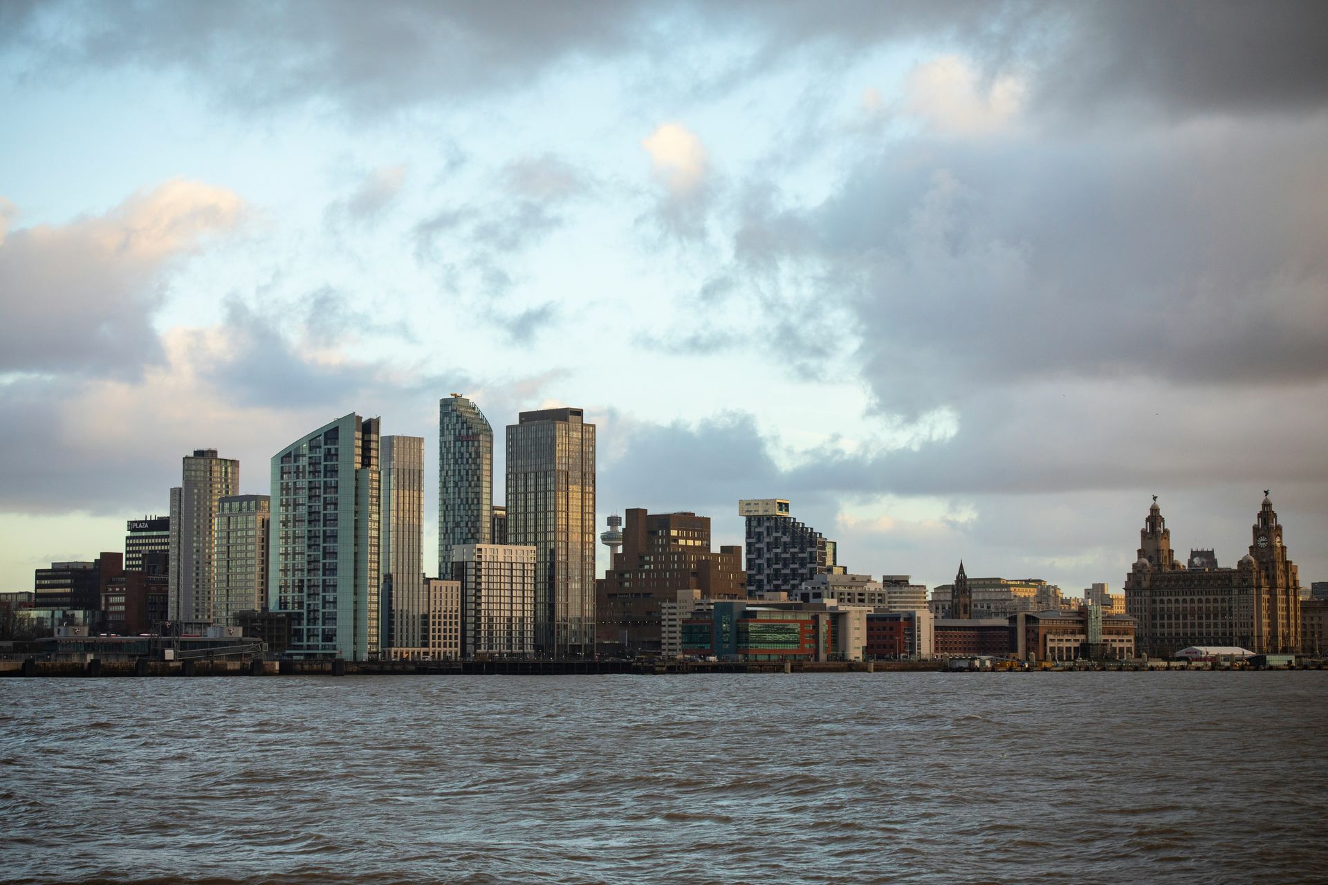 Liverpool waterfront skyline viewed across the River Mersey, including the Royal Liver Building